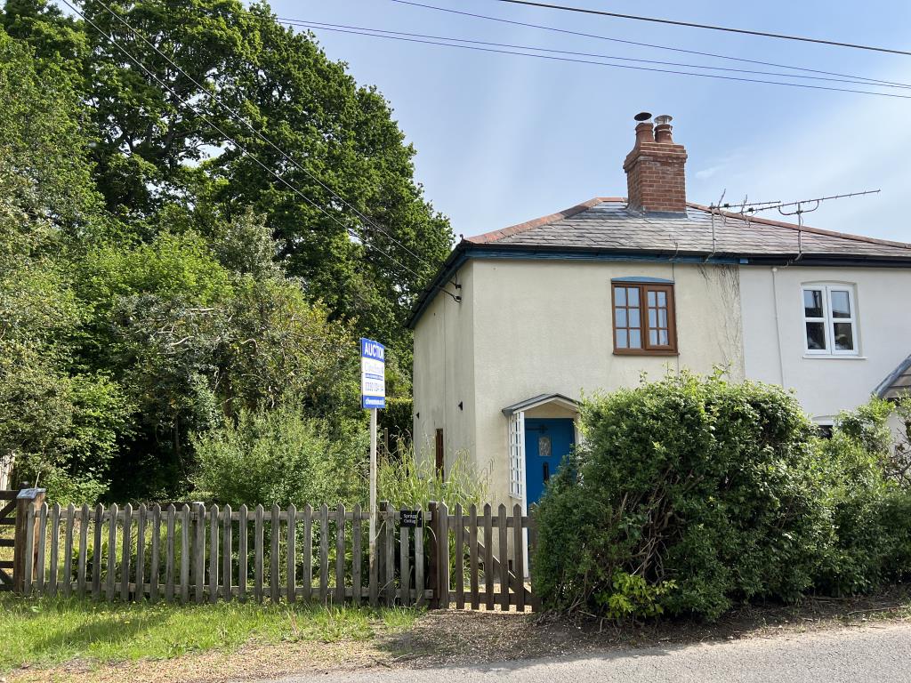 Lot: 25 - TWO-BEDROOM COTTAGE IN NEED OF IMPROVEMENT - Front view of Cottage with large Garden